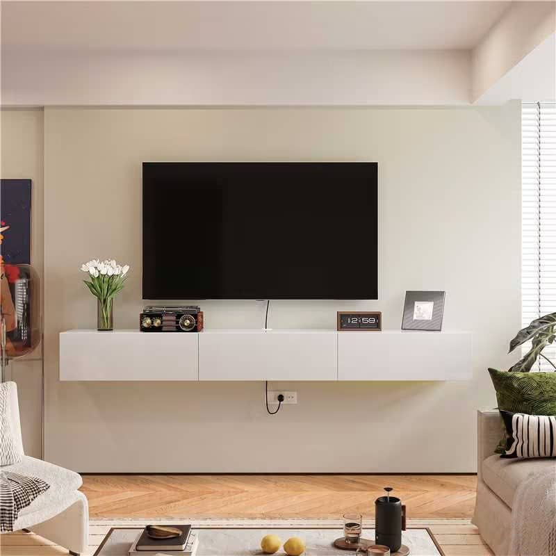 wall mounted white gloss TV stand in living room with storage