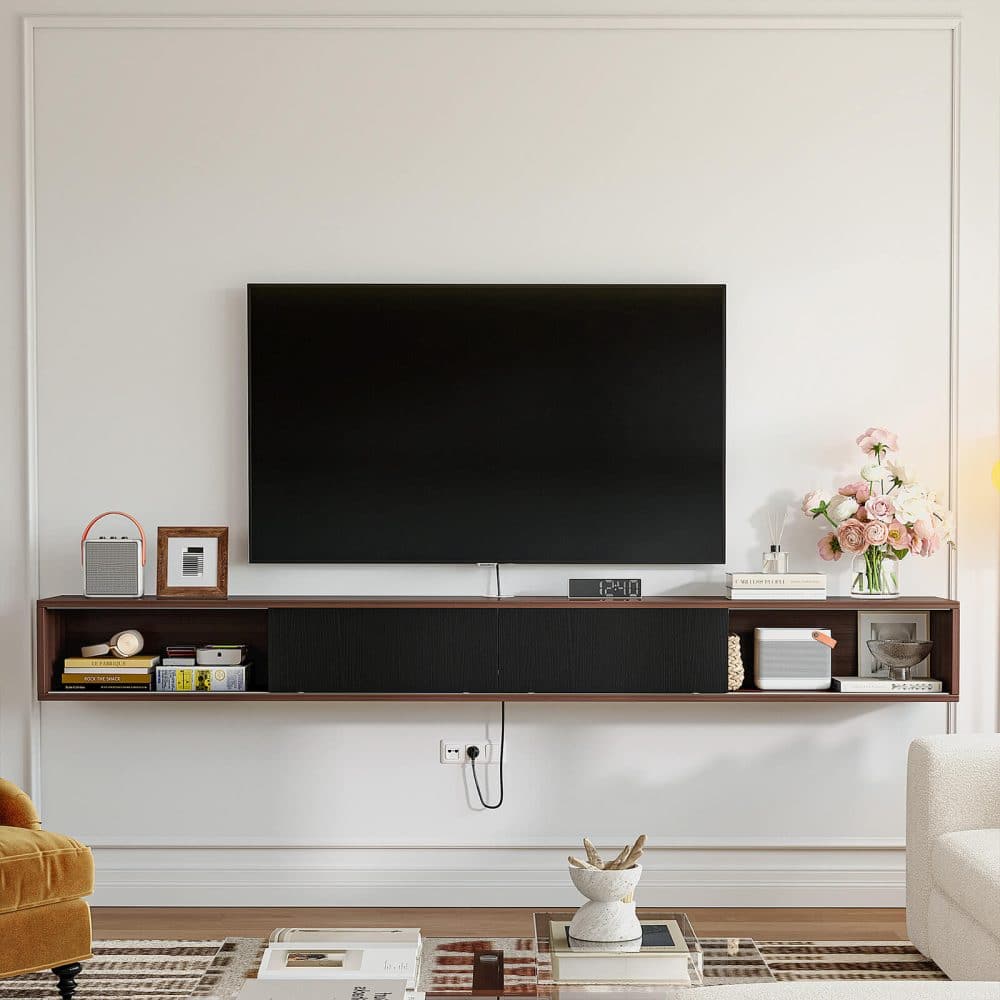 Walnut floating sliding door tv stand, mounted on a white wall below a television.