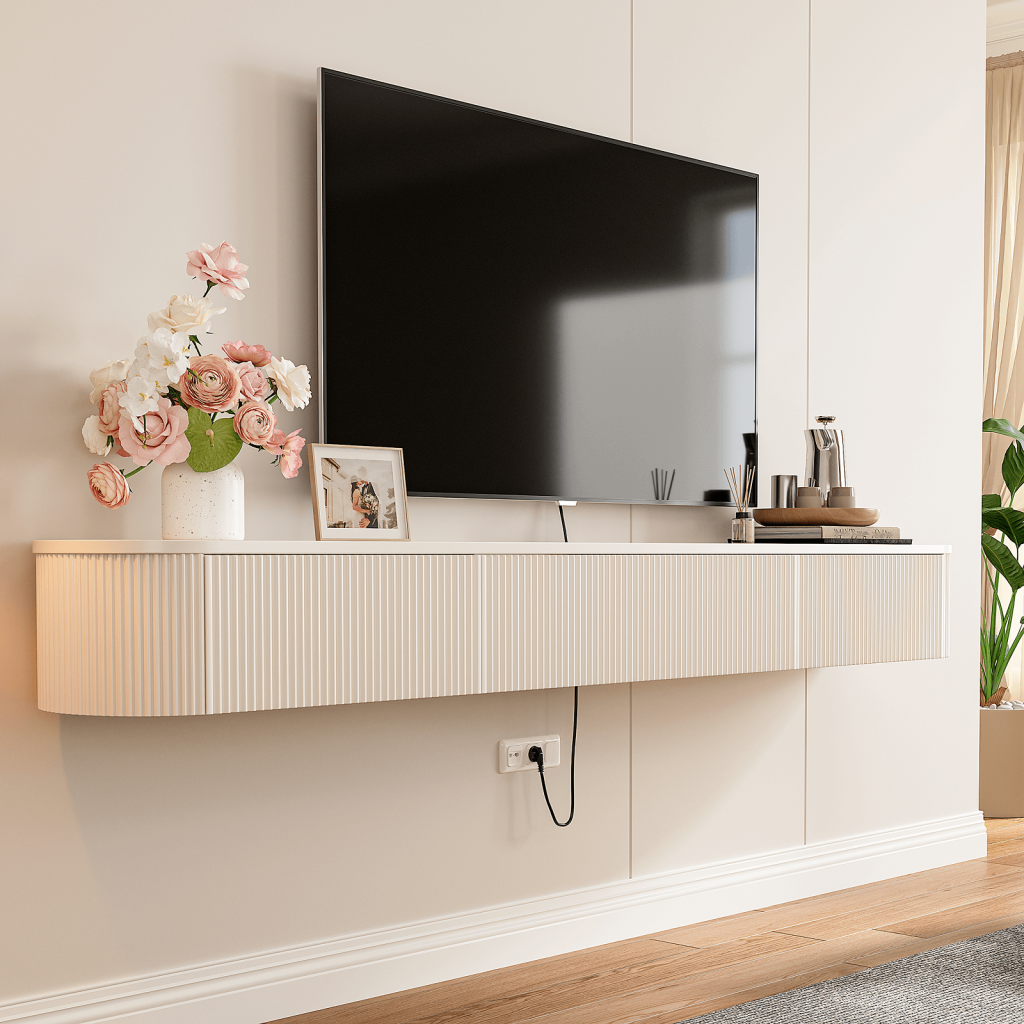 White matte custom floating TV stand with rounded edges and wall-mounted design
