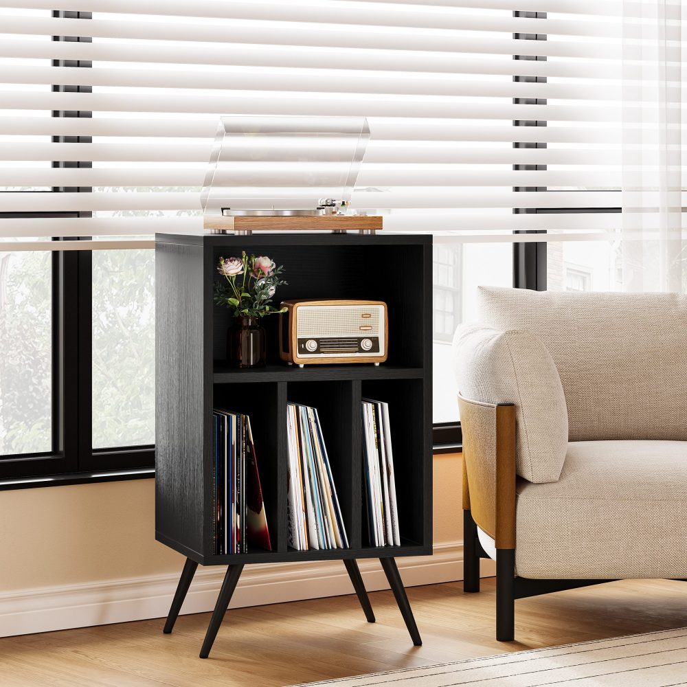 Black Vintage Record Player Stand for vinyl record lovers besides sofa in the living room.