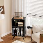 minimalist black record player stand storage besides living room sofa.