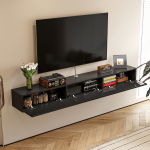 Space-saving wall-hanging TV cabinet with drop-down doors for minimalist living room storage.