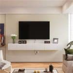 wall mounted white gloss TV stand in living room with storage