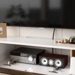 Stylish white entertainment unit with flip-down door and open tech shelf