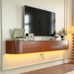 Curved-end floating media console in walnut finish under mounted TV