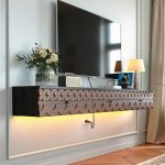 wall-mounted TV cabinet with decorative wood carving