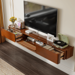 Wall-mounted custom TV stand with solid walnut finish and rattan-front cabinet storing a gaming console