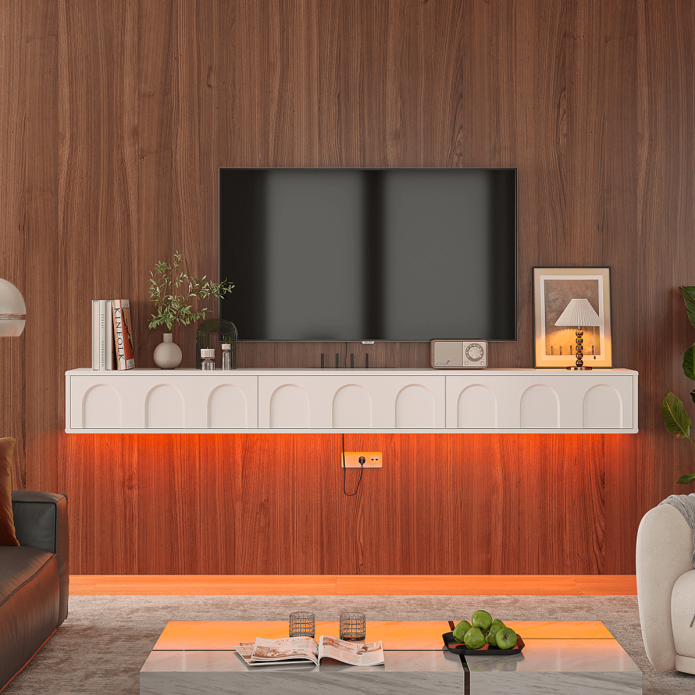 wall mounted tv cabinet white with decorative accessories on top, illustrating a space-saving living room design.