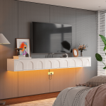 White wall-mounted TV stand with soft under-cabinet lighting, creating a warm, ambient glow in a modern living space.