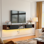 walnut cabinet with black sliding cabinet doors on the wall-mounted TV stand