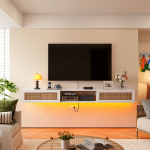 Modern white floating TV stand with rattan doors and open shelf, wall-mounted design for stylish living rooms.