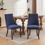 Contemporary dining chair featuring soft blue upholstery and curved wooden legs