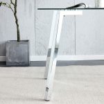 Elegant glass dining table combining clarity, strength, and modern design