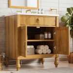 Freestanding bathroom vanity with white sink and solid wood cabinet