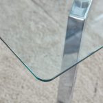 Minimalist glass dining table designed for modern dining rooms