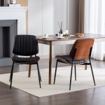 Modern dining chair set designed with cushioned seat and sleek matte black legs