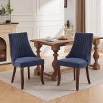 Modern fabric dining chair in navy blue with padded seat and solid wood frame