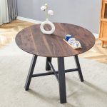 Round solid wood table with industrial metal legs design