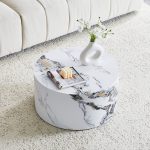 Minimalist round marble look coffee table styled with sofa and neutral rug