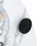 Contemporary round coffee table with white marble pattern and smooth edges