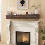 Wall-mounted floating fireplace mantel shelf in walnut wood finish, no installation required, styled above a classic white fireplace with modern decor