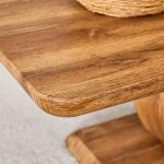 MDF wood coffee table with unique pedestal base and silver trim design