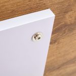 Stylish wooden coffee table featuring wood grain veneer and metal detailing