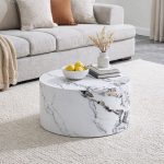 Round wooden coffee table with white marble veneer in modern minimalist living room