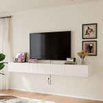 Contemporary white media console with vertical slat cabinet doors.