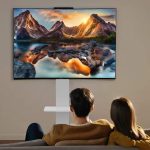 Sturdy mobile TV stand on wheels, white, with shelves and casters.