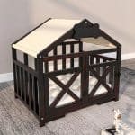 Black wooden indoor dog house, luxury furniture-grade pet kennel crate for small dogs.