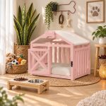 Pink wooden indoor pet house with pitched roof and cushion